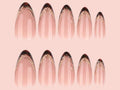 Set of nail extensions with a gold accent on a pink background